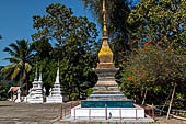 Wat Xieng Thong temple in Luang Prabang, Laos. Small 'that' (stupa) inside the temple precinct. 